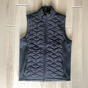 Under Armour Coldgear Reactant puffer-style vest. Color black. Size large.